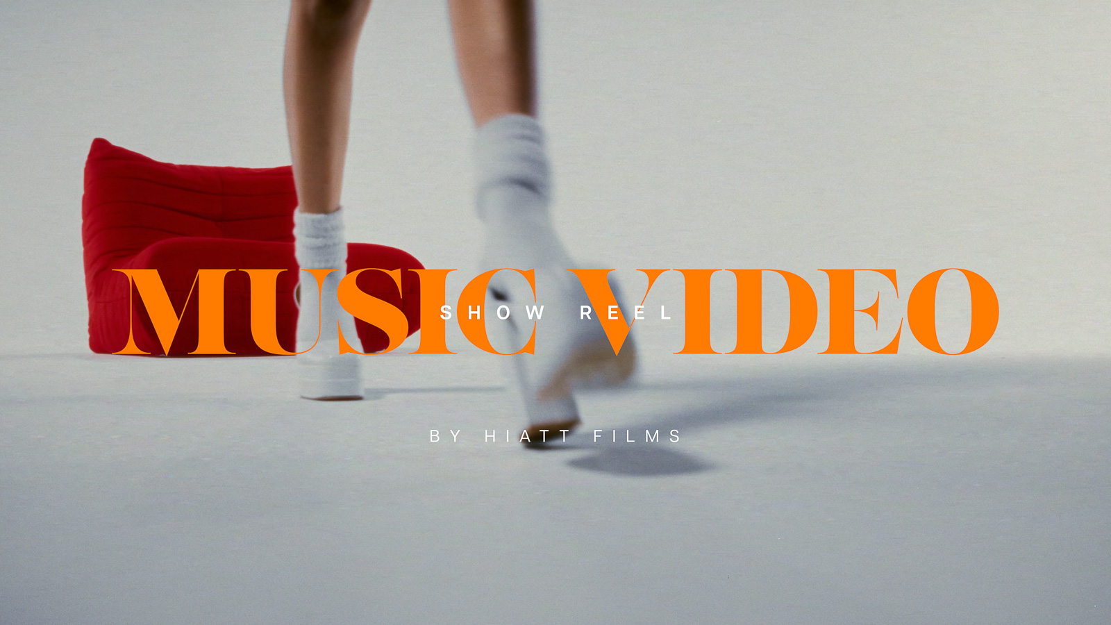 Music video show reel thumbnail featuring a dancer in motion on a minimalist white set, produced by Hiatt Films