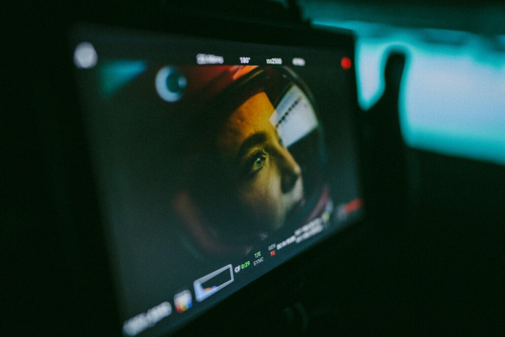 Close up of production monitor showing emotional performance during cinematic video shoot