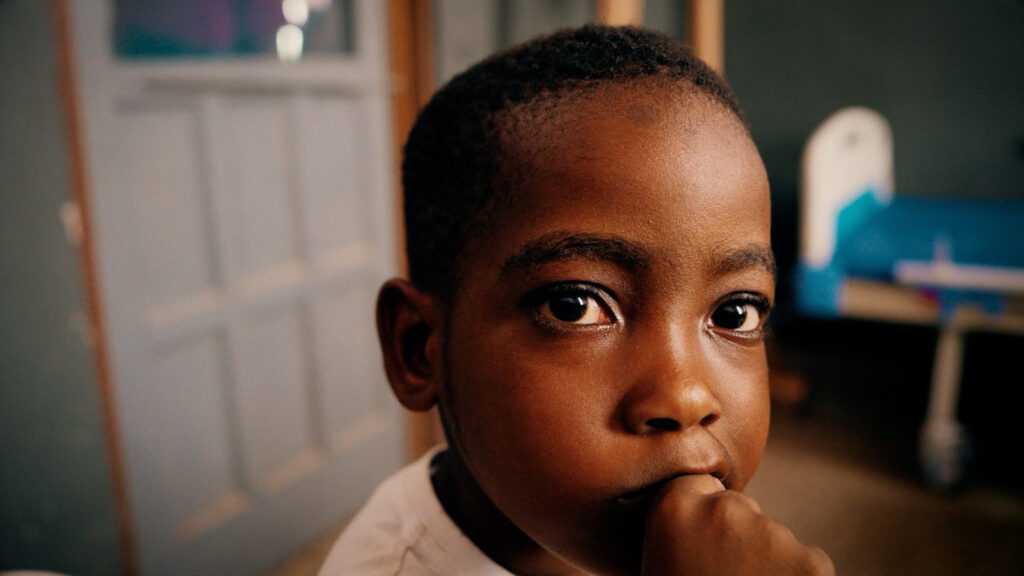 Cinematic portrait of a child indoors with natural light and shallow depth of field, filmed by Hiatt Films